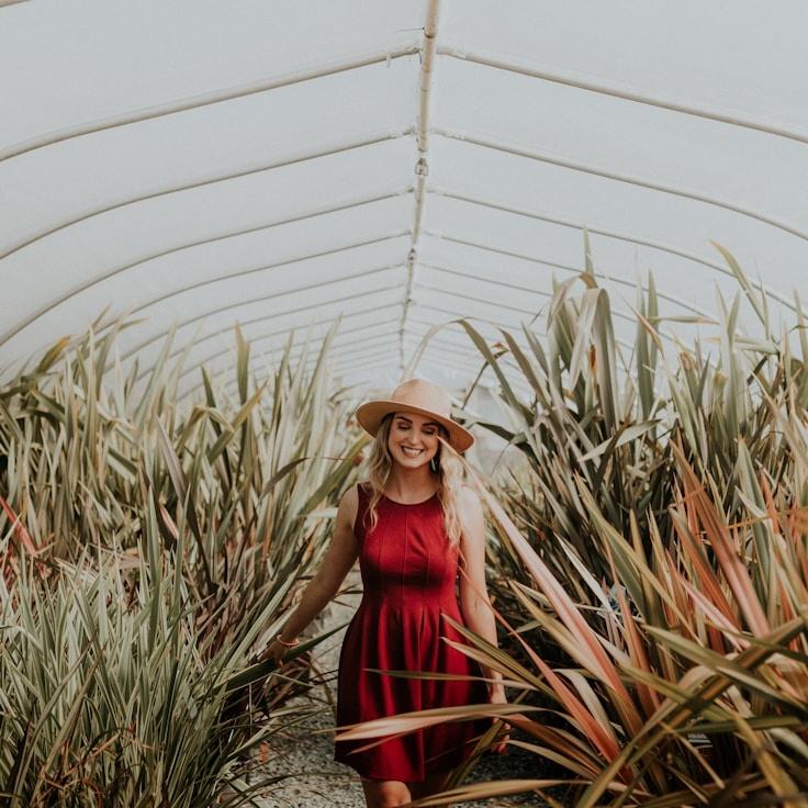 Kaveri Mehta, Lead Design Curator at OceanJournalWay, reviewing corporate floral arrangements